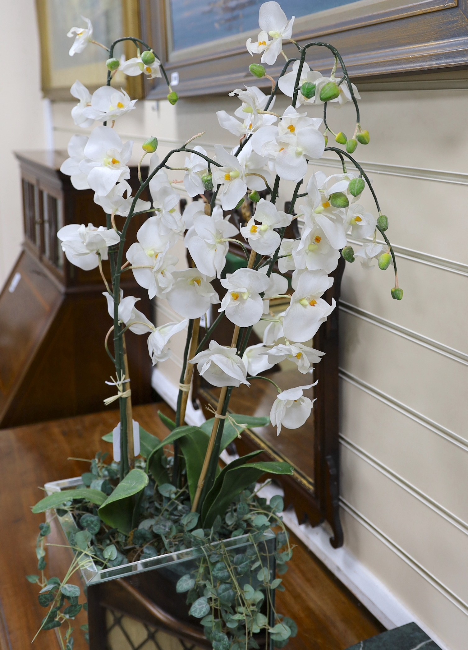 A display of tall white silk orchids in mirrored planter, approx 82cm